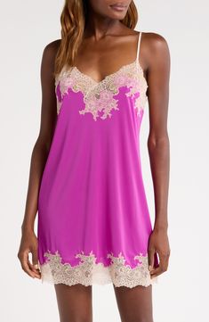 Bring an alluring style refresh to your sleepwear collection with this silky satin chemise veiled with pretty floral lace. 25 1/2" center front length (size Medium) V-neck Adjustable straps Unlined 100% polyester with 90% nylon, 10% elastane trim Machine wash, line dry Imported Satin V-neck Slip Dress With Contrast Lace, Lace Patchwork Satin Slip Dress, Feminine Satin V-neck Sleepwear, Satin Slip Dress With Contrast Lace V-neck, Silk Sleepwear With Lace Trim For Wedding Night, Elegant Pink Sleeveless Chemise, Elegant Sleeveless Pink Chemise, Feminine Silk Nightgown With Spaghetti Straps, Silk Slip Dress With Lace Trim For Loungewear