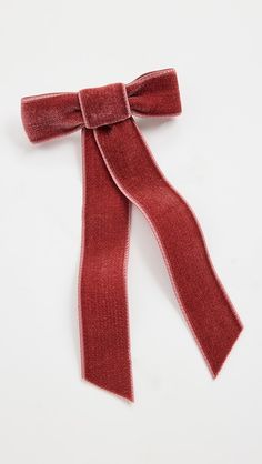 a red ribbon on a white background