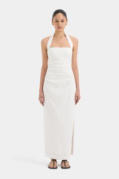 Crafted from a midweight linen fabric, offering a relaxed fitting shape, the Noemi Halter Midi Dress in ivory is the perfect warm-weather dress. Featuring a halter neck design and tucks through the body that create a flattering fit. Pair back with sandals for an elevated look. Future Clothes, Maxi Dress Sale, Halter Midi Dress, Natural Fibre, Black Wedding Dresses, Free Flowing, Dress Cuts, Linen Dresses, Event Dresses