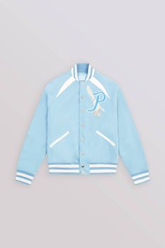 • Sky Blue varsity jacket. • Raglan sleeves. • Sublimated patches hand stitched on front and back. • P letter and Paradis artwork embroidered at chest and back. • Ribbed knit trims. • Double welt pockets at front and at interior.• Fully lined interior. • Engraved Silver Snap buttons closure. • External fabric: 100% cotton Lining: 100% Bemberg. Blue Varsity Jacket, P Letter, Knitwear Dress, Silver Engraving, Denim Coat, Sweaters Knitwear, Jacket Sale, Welt Pockets, Hand Stitched