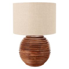 a wooden table lamp with a beige shade