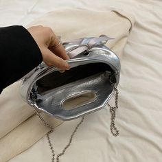 UAKISS - Small Bow Pu Leather Shoulder Bags for Women 2024 Summer Trend Designer Fashion Handbags and Purses Trend Chain Crossbody Bag SIZE: (Upper Width)25cm * (Lower Width)20cm * (Height)17cm * (Thickness)11cm Shoulder Belt Length:104cm Modern Silver Bucket Shoulder Bag, Shoulder Bag With Silver-tone Hardware For Fashion Accessory, Party Shoulder Bag With Silver-tone Hardware, Bucket Shape, Modern Bucket Shoulder Bag With Silver-tone Hardware, Edgy Shoulder Bag With Silver-tone Hardware, Casual Elegant Style, Leather Shoulder Bags, Purse Trends, Shoulder Belt