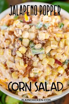 corn salad in a bowl with text overlay that reads jalapeno popper corn salad