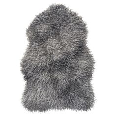 a close up of a furry rug on a white background