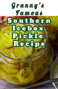 a glass jar filled with pickles and lemons