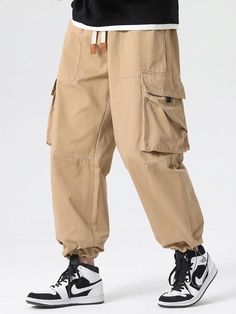 Experience the perfect blend of comfort and style with our Drawstring Cuff Parachute Cargo Pants. Made from high-quality cotton, these pants provide a soft and comfortable feel. The adjustable drawstring cuffs offer a personalized fit, while the multiple cargo pockets provide ample storage space. Enhance your casual ensemble effortlessly with this versatile piece. Specifications: Material: Cotton Package included: 1*Pants. Size Chart (inches): Size Waist Hip Length XS 27.6 44.1 38.6 S 29.1 45.7 Parachute Cargo Pants, Parachute Cargo, Paisley Shorts, Mens Swim Trunks, Blue Waves, Beach Shorts, Boxer Shorts, Man Swimming, Drawstring Pants