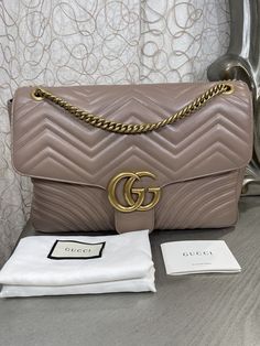 Condition: Excellent Exterior: Slight creasing throughout and on under flap, no corner damage or deep scratches Interior: No marks/discoloration, no odor or residue Hardware: Little to no scratches Comes With: Dust bag Luxury Sling Bag, Gucci Marmont Mini, Sling Bags Women, Gucci Handbag, Women's Bags By Shape, Gucci Marmont, Women's Bags By Style, Gucci Gg Marmont, Sling Bags