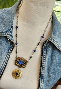 I really love this romantic necklace! This striking dark sapphire necklace features a 2 3/4" pendant that is made of a vintage sapphire crystal brooch and a functional assemblage vintage locket. The linked chain is created using sapphire Miriam Haskell links and large dark sapphire Swarovski crystals. The chain is 22" long. You can wear it long, or as short as you would like. It's a perfect for the holidays, a birthday or an anniversary....or just buy it for yourself. Please see the other necklaces in my shop.   I have included free First Class shipping within the USA which will take 4-5 days.  If you need faster delivery you can upgrade to a faster option for an additional charge.    Please let me know if you have any questions! Vintage Locket, Romantic Necklace, Vintage Assemblage, Vintage Sapphire, Dark Sapphire, Vintage Lockets, Miriam Haskell, Crystal Brooch, Sapphire Necklace