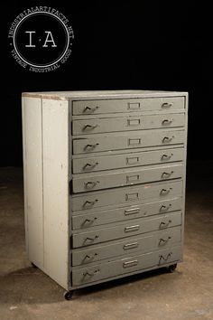 an old metal filing cabinet with five drawers