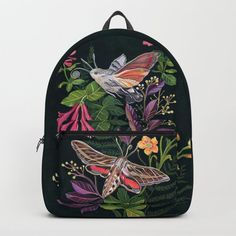 Designing our premium Backpacks is a meticulous process, as Artists have to lay out their artwork on each component. One size fits all men and women, with heavy-duty construction that's able to handle the heavy lifting for all your school and travel needs.       - Standard unisex size: 17.75" (H) x 12.25" (W) x 5.75" (D)    - Crafted with durable spun poly fabric for high print quality    - Interior pocket fits up to 15" laptop    - Padded nylon back and bottom    - Adjustable shoulder straps Indie Bags, Indie Bag, Fashion Women Clothes, Night Moth, Cottagecore Goblincore, Wing Art, Hummingbird Moth, Stargazer Lily, School Accessories