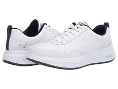 SKECHERS Performance Go Walk Steady - Men's Shoes : White/Navy : With a smooth action leather upper, cooling perforations, and premium cushioning, the SKECHERS Go Walk Steady sneaker will simplify your casual days with comfort and crisp style. Lace-up design offers a secure fit. Rounded toe. Leather overlays at the toe, sides, and heel provide stability. Relaxed Fit design provides room and comfort at the toe and forefoot. Padded tongue and collar. Rear pull-tab at the heel offers easy entry. Si Sporty White Walking Shoes With Perforated Toe Box, White Walking Shoes For Light Sports With Removable Insole, White Walking Shoes With Removable Insole For Light Sports, Comfortable White Walking Shoes With Slip-resistance, White Leather Walking Shoes For Sports, Comfortable Slip-resistant White Walking Shoes, White Leather Slip-resistant Walking Shoes, Functional White Leather Walking Shoes, Sporty White Walking Shoes With Removable Insole