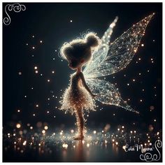 a fairy is standing in the dark with sparkles all around her and holding on to it's wings