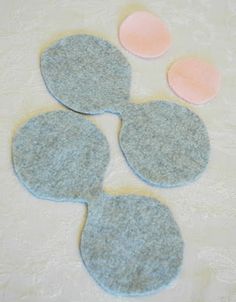 three felt circles sitting on top of a table