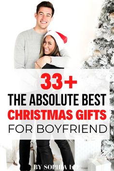 a man and woman standing in front of a christmas tree with the text, 33 + the absolute best christmas gifts for boyfriend