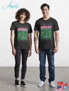 two people standing next to each other in front of a white brick wall wearing t - shirts with the words turnoverer and good nature