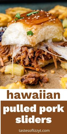 hawaiian pulled pork sliders with pineapple slaw and bbq sauce on top