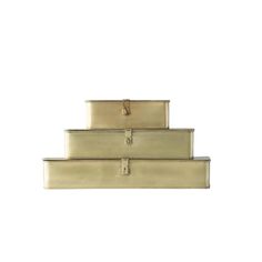 three gold boxes stacked on top of each other