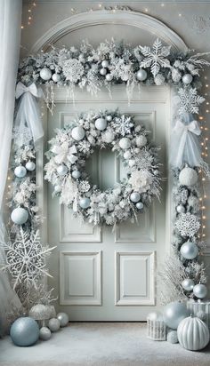 a white door decorated with christmas decorations and ornaments, surrounded by snowflakes