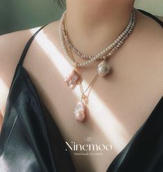 This pendant showcases a captivating gold-flecked baroque pearl, with its natural, unique shape and delicate gold specks, ensuring every piece is one of a kind. The pendant clasp can be opened for added versatility. Paired with a classic white pearl necklace, the combination creates a timeless and elegant contrast. Complete your look with matching earrings from the collection. Composition: Gold Filled/pearl/zircon Handle Gently: Avoid contact with perfumes, cosmetics, and harsh chemicals. Show L Baroque Pearl Jewelry With Pearl Charm, Luxury Baroque Pearl Necklaces, Gold Necklace With Pearl Charm, Unique Gold Necklace With Pearl Charm, Baroque Pearl Jewelry With High Luster, Unique Gold Baroque Pearl Necklaces, Unique Pearl Charm Pendant Necklace, Unique Pearl Necklaces With Pearl Pendant, Unique Pearl Pendant Necklace With Charm