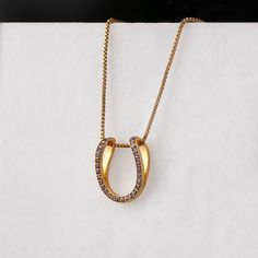 URBAN-EQUESTRIAN’s Horseshoe Jewelry collection blends equestrian heritage with contemporary style. Meticulously designed horseshoe rings, bracelets, and necklaces showcase the artistry of expert craftsmanship and exude a timeless elegance. Add a sophisticated equestrian flair with these stunning pieces. Dressage Movements, Classical Dressage, Equestrian Ring, Silver Horseshoe Necklace, Horseshoe Design, Horseshoe Jewelry, Shoe Pendant, Horseshoe Ring, Horseshoe Pendant