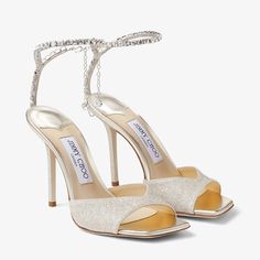 SAEDA SANDAL 100 | Platinum Ice Dusty Glitter Sandals with Crystal Embellishment | Winter 2022 collection | JIMMY CHOO UK Jimmy Choo Saeda 100, Jimmy Choo Saeda, Evening Heels, Glitter Sandals, Jimmy Choo Heels, Leather Lingerie, Crystal Chain, Boot Pumps, Crystal Embellishment