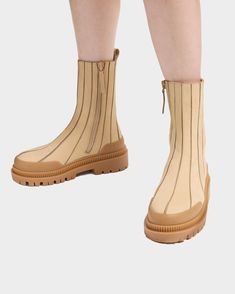 “GABI” is your new daily staple. A sleek hybrid of a Chelsea/Sock boot, these are a perfect blend of cute + comfy. Pair them with baggy jeans, slacks or a mini skirt for a chunky statement pair that fit perfectly around your ankles for a high-fashion profile. The colour may vary slightly and may contain natural imperfections due to the nature of the leather used. Runs slightly large to size. If you are in between sizes, we recommend sizing down. Fashion Profile, Sock Boot, Leather Socks, Cute Comfy, Boot Bag, Nubuck Leather, The Colour, Baggy Jeans, Sneaker Boots