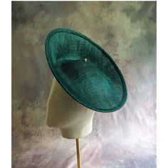 One hat base with a 3.75" tall upturned brim made in teal green stiffened sinamay straw that measures approximately 11" (27.94 cm) in diameter at the top. The base is contoured to fit against the head. The edges of the brim are finished in sinamay. The multi-layer stiffened sinamay straw has a great sturdy weave and provides excellent support for your millinery creations. This is NOT a ready to wear  finished hat and it will not stay on your head unless you add a head band to wear it. This base does have a small sleeve sewn into the crown that will accomodate headbands listed separately in my shop. Add embellishments of your choice. A nice high quality base - I know you'll be pleased! This hat base is listed separately in other colors. Check my listings for available options... Lots of hat Fitted Green Fedora For Kentucky Derby, Spring Fitted Green Fedora, Fitted Green Brimmed Fedora, Green Tailored Brimmed Fedora, Green Adjustable Hat Bands For Kentucky Derby, Adjustable Green Hat Bands For Kentucky Derby, Adjustable Green Hat Band For Kentucky Derby, Green Fedora Straw Hat For Kentucky Derby, Green Flat Brim Hat For Kentucky Derby