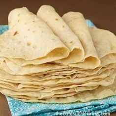 homemade flour tortillas stacked on top of each other