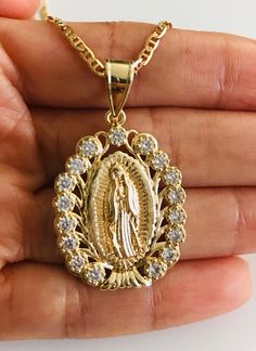 "18K GOLD FILLED GUADALUPE NECKLACE 22\" LONG.. CZ VIRGIN OF GUADALUPE. VIRGIN MARY. FOR GOOD LUCK ,PROSPERITY AND PROTECTION. PENDANT: 40 x 25 mm 18K GOLD FILLED CADENA DE GUADALUPE 22\" LARGO .. VIRGEN DE GUADALUPE CON ZIRCONIA. PARA PROSPERIDAD, BUENA SUERTE Y PROTECCION. DIJE: 40 x 25 mm" Gold Our Lady Of Guadalupe Medallion, Gold Our Lady Of Guadalupe Necklace In 14k Gold, 14k Gold Our Lady Of Guadalupe Necklace, 14k Gold Necklace With Our Lady Of Guadalupe, Guadalupe Necklace, Protection Pendant, Mary Necklace, Figaro Necklace, Virgin Of Guadalupe