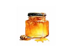 a jar filled with honey sitting on top of a table