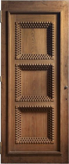 a wooden door with four squares on the front and side panels, all made out of wood