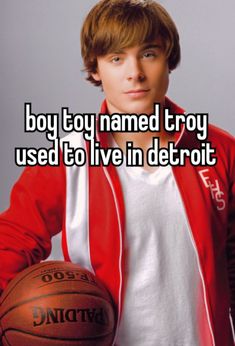 a young man holding a basketball in his hand and the words boy boy named troy used to live in detroit