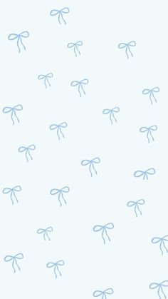 blue bows on a white background for wallpaper or wrapping paper that looks like fabric