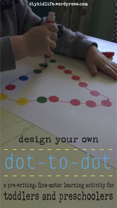 a young child is doing dot - to - dot on paper with the words design your own