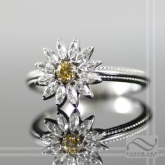 A simple and fun daisy with, this ring features natural diamonds or moissanite, as the white petals with the center stone being a yellow diamond in either case. All rings are carefully crafted using USA refined solid white gold and quality stones that will dazzle in the sun. Features: ~Solid 14k white gold ~Diamonds will be fair trade, SI-1, GH or better, Marquise cuts, 3x1.5mm each ~If moissanite is selected, I use stones of a matching grade and clarity. ~All stones are beautifully cut, eye cle 1000 Yellow Daisies Proposal, Daisy Engagement Ring, Engraved Handwriting, Band Mom, White Petals, Daisy Ring, Yellow Diamond, Ring Box, White Gold Diamonds