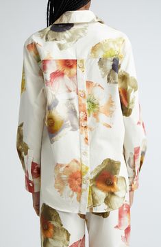 Cut from organic cotton and bursting with blooms, this is the shirt that starts the best day ever. 31" inseam; 24" leg opening; 14 1/2" front rise; 16 1/2" back rise (size 2xl) Front button closure Spread collar Long sleeves with one-button cuffs 100% organic cotton Dry clean or machine wash, line dry Imported Cotton Shirt For Spring Daywear, Floral Print Cotton Button-up Tops, Cotton Floral Print Button-up Top, Cotton Button-up Top With Floral Print, Spring Floral Print Blouse With Spread Collar, Spring Floral Print Shirt For Daywear, Spring Floral Print Shirt With Relaxed Fit, Floral Print Shirt For Spring Daywear, Floral Print Spread Collar Blouse For Daywear