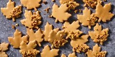 some cookies that have been cut in half and are sitting on a table with peanut butter sprinkles