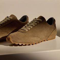 Our Low Running Sneaker is made with Italian suede with Italian leather lining. This sneaker is perfect for everyday wear. Style details include soft suede uppers and Flexible Geometric Tread Outsole. Additional Information:• 100% Calf Leather • Removable Fabric-Covered Insole• Imported Denim Polo, Backpack Tote Bag, Suede Sneakers, Running Sneakers, Tote Backpack, Soft Suede, Duffel Bag, Fabric Covered, Italian Leather