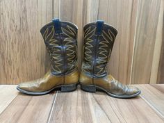 "Vintage Nocoma western Phoenix stitching cowboy two tone boots size 9 1/2 EE, cool stitch pattern. Good used condition, some wear, marks, scuffs, scratches show heel wear and on the sole, check pictures. Made in U.S.A.  Please, check carefully the measurements, photos and description of the article before buying it, we do not accept changes or returns. Outsole Approximate Dimensions: 11 3/4\"   long heel to toe. 11 1/4\"    Inside from the heel to the toe. 4 1/2\"   Widest wide in front of footwear. 1 1/4\"    Tall heel. 13 1/2\"  Tall total. Let me know if you have any questions or would like to see additional photos. International buyers: Please ask for the shipping rates speciality for your country." Two Tone Boots, Mens Cowboy, Cowboy Western, Mens Shoes Boots, Western Cowboy Boots, Stitching Leather, Western Cowboy, Western Boots, Stitch Pattern