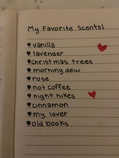 an open book with writing on it that says, my favorite scents vanilla lavender christmas trees morning dew rose night coffee cinnamon old books