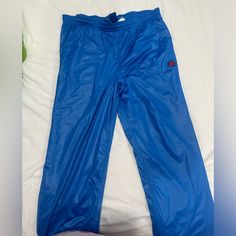 For Sale Is A Vintage Preowned In Near Pristine Condition Pair Of Nike John Mcenroe Warmup Tennis Pants. Pants Are Men's Size Large. Pants Are In Absolutely Pristine Vintage Condition. No Rips, Stains, Holes, Or Defects Of Any Kinds. Have Been Stored Properly For Several Decades. Please See Detailed Photos For Evidence Of Condition And Measurements. Nike Blue Bottoms With Elastic Waistband, Blue Nike Bottoms With Pockets, Nike Trousers For Workwear, Nike Straight Leg Workwear Bottoms, Nike Fitted Pants With Pockets, John Mcenroe, Nike Pants, Pants Large, Nike Men