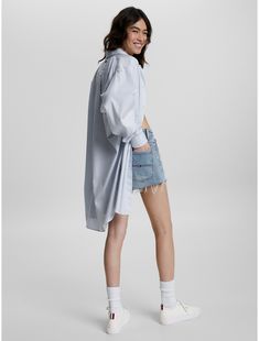 Tommy Hilfiger women's dress. Our shirtdress is an easy one-and-done piece. A partnership with purpose. Tommy Hilfiger x Shawn Mendes features our all-time prep classics, reborn more sustainably.  Material: 58% Organic Cotton, 42% Lyocell. Spring Relaxed Fit Shirt Dress For Daywear, Spring Daywear Dress With Shirttail Hem, Knee-length Shirt Dress For Daywear, Spring Dresses With Relaxed Fit And Shirttail Hem, Collared Shirt Dress For Spring Daywear, Spring Collared Shirt Dress For Daywear, Spring Shirt Dress With Shirttail Hem For Day Out, Relaxed Fit Collared Shirt Dress For Spring, Classic Shirt Dress With Spread Collar For Spring