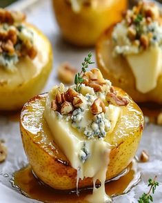 baked potatoes with blue cheese and nuts on top