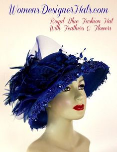 Ladies Royal Blue Designer Kentucky Derby Hat With Striped Royal Blue Exotic Feathers, Accented With Delicate Hand Dyed Royal Blue Flowers With Royal Blue Pearls. A Beautiful Royal Blue Sequin Pearl Trim Wraps Around The Crown Of This Occasion Hat. This Designer Custom Made Hat Is A Show Stopper. This Fashion Hat Is Suited For The Holidays, Church, Synagogue, Cocktail Black Tie Parties, Weddings And Formals. Women's Designer Hats Specializes In Custom Made Designer Hats For Women, Cocktail Hats, Hat Wedding Guest, Wedding Guest Hat, Royal Blue Fashion, Wedding Hats For Guests, Special Occasion Hats, Mother Of The Bride Hats, Church Lady Hats, Ladies Dress Hats, Royal Blue Flowers