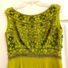 Rare 60’ss Offering. Shades Of Green Apple Green, French Green ( Chartreuse), Loden Green And Emerald Greens 3d Beading , Bugle Beads And Seed Breads White Pearls And Emerald Rhinestones Empire Style W Dangle Pearls Sheath. Bodice Lined In Applegreen Rayon/ Silk Long Metal Back Zipper Sz Z12 60’s Is More Like A Size 8. Slight Skirt Flare Bottom Back Loose Silk Lining Hem & Lining Need Re Hemming, A Few Beads Missing On Shoulder A Vintage Masterpiece That With Minor Fix Will Be Brought Back To Vi 3d Beading, Loden Green, Green Chartreuse, Green French, French Green, Vintage Couture, Empire Style, Bugle Beads, Apple Green