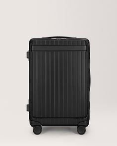 The Carry-on X · CarlFriedrik Efficient Packing, Stylish Luggage, Blue Box, Laptop Pocket, Travel Case, Black Design, Travel Essentials, Easy Access, Front Pocket