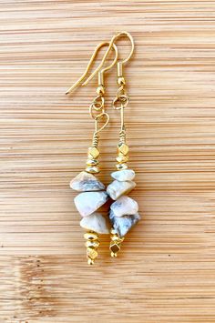 The TUSCAN SUN Crazy Lace Agate Chip Earrings were created with the lovely neutral Crazy Lace Agate chip gemstones with squared gold hematites to add a bit of uniqueness & more! These earrings are part of the 2022 POLYCHROMOS COLLECTION. Complete your look by adding the matching necklace, bracelet or loc jewel. Specifically created to match the 2022 Pieces Collection. Mix & match your jewels to enhance your outfit and exude your style! Length 1-1.5 in drop Gold Agate Gemstone Earrings, Gold Agate Earrings With Natural Stones, Gold Agate Earrings For Jewelry Making, Gold Earrings With Natural Agate Stones, Gold Agate Earrings, Chip Earrings, Blue Sodalite, Crazy Lace Agate, Lace Agate