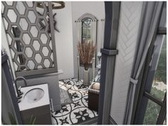 the bathroom is decorated in white and grey colors with black accents, including a mirror