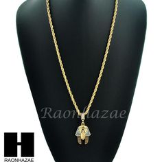 Color : GOLD Brand New Rapper Chain Freemason Pendant Size : Appx. 1.0" x 2.0" Chain : 4mm 24" Rope Chain Stone : Cubic Zirconia Stone & Sand Blast Plated : 14k Gold Plated Chain & Pendant Condition: 100% Brand New High Polish Gold Rope Chain Jewelry For Streetwear, Gold Rope Chain Jewelry, Gold Figaro Chain Jewelry For Streetwear, Gold Figaro Chain Necklace For Streetwear, Cuban Link Rope Chain Necklace For Streetwear, Streetwear Cuban Link Rope Chain Necklace, Gold Plated Cuban Link Rope Chain Necklace, Gold Metal Necklaces For Streetwear, Egyptian King