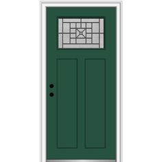 a green door with a glass window